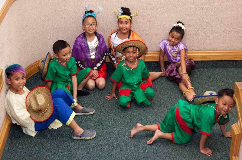Youth dancers and supporters together at a community event